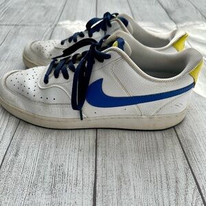 Nike size 10.5 white leather sneakers